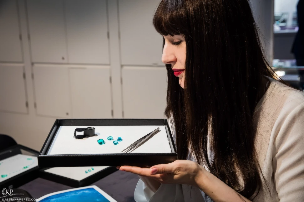 <p>Katerina Perez looking at Paraiba tourmalines from Paul Wild. Photo by Simon Martner for katerinaperez.com</p>
