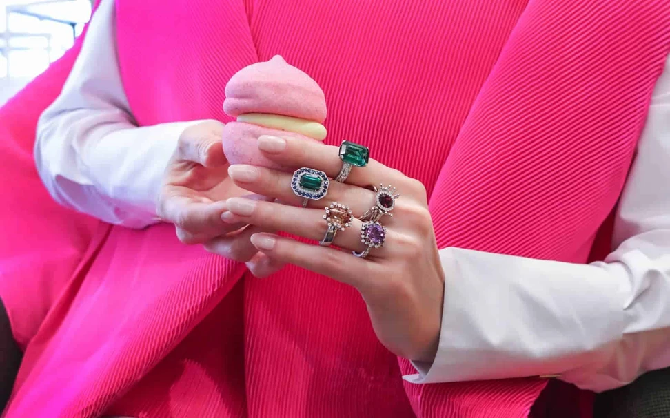 <p>Katerina Perez wears coloured gemstone rings by Korbička Šperky</p>