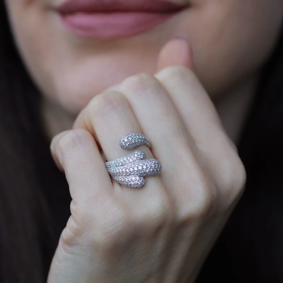 <p>The Lumen of Grace ring, h<span class="TextRun SCXP240863294 BCX0" lang="EN-US" xml:lang="EN-US" data-scheme-color="@000000,," data-usefontface="true" data-contrast="none"><span class="NormalTextRun SCXP240863294 BCX0">andcrafted in 18k white gold and set with </span></span><span class="TextRun SCXP240863294 BCX0" lang="EN-US" xml:lang="EN-US" data-scheme-color="@000000,," data-usefontface="true" data-contrast="none"><span class="NormalTextRun SCXP240863294 BCX0">diamonds totalling 2.20 carats</span></span></p>