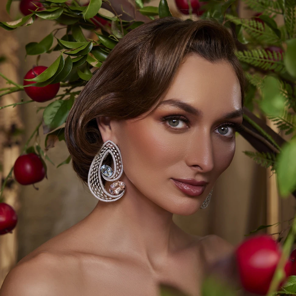 <p>Two stones, one bold story: morganite, aquamarine and diamond Mrs. Marquise earrings</p>