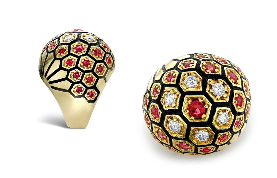 <p>Retro diamond and ruby honeycomb bombé ring in 18 carat yellow gold. Available at Pragnell. </p>
