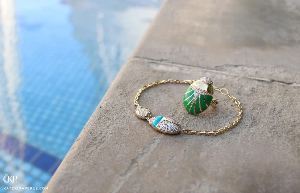 <p>Rock by GS Scarab ring and bracelet from The Scarab collection with diamonds and enamel in 18k gold </p>