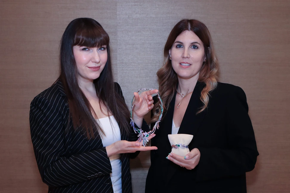 <p>Katerina Perez exploring the SICIS Colibrì necklace and bracelet with SICIS Creative Director Gioia Placuzzi</p>
