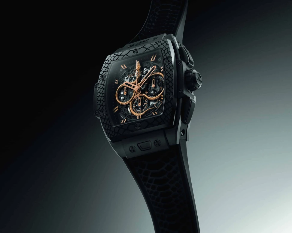 <p>Hublot Spirit of Big Bang Year of the Snake watch with reptilian textured black ceramic and a three-dimensional golden snake that wraps around the dial</p>
