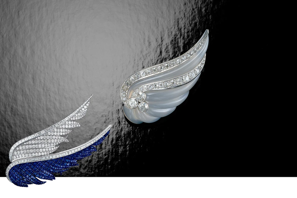 <p>Suzanne Belperron carved brooch with diamonds and Van Cleef&Arpels diamond and sapphire brooch</p>