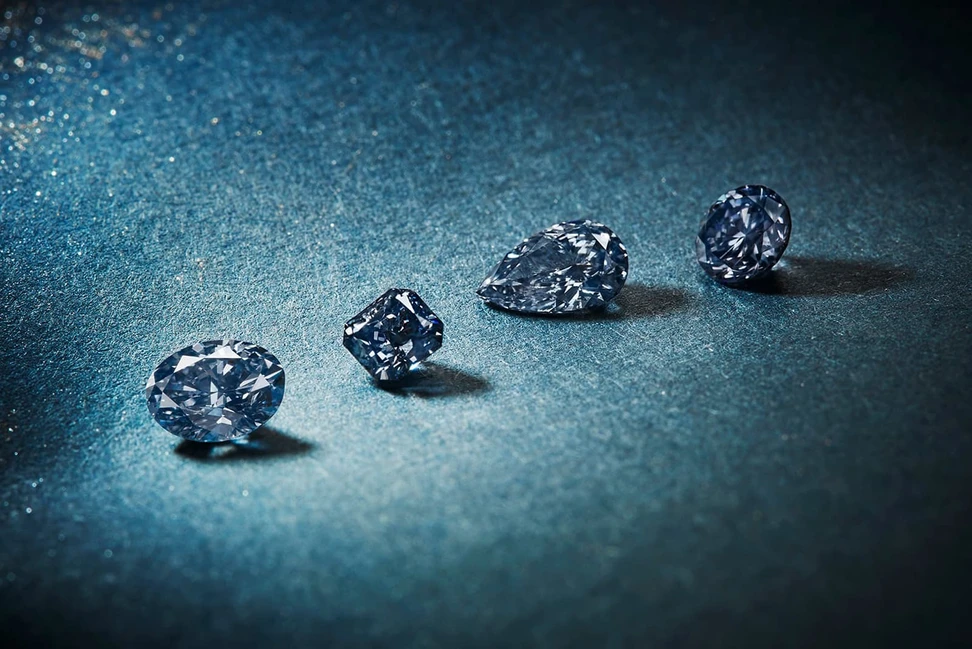 <p>The ‘Once in a Blue Moon’ collection of 41 diamonds weighs 24.88 carats in total and represents the final blue and violet diamonds to emerge from the Argyle Mine</p>
