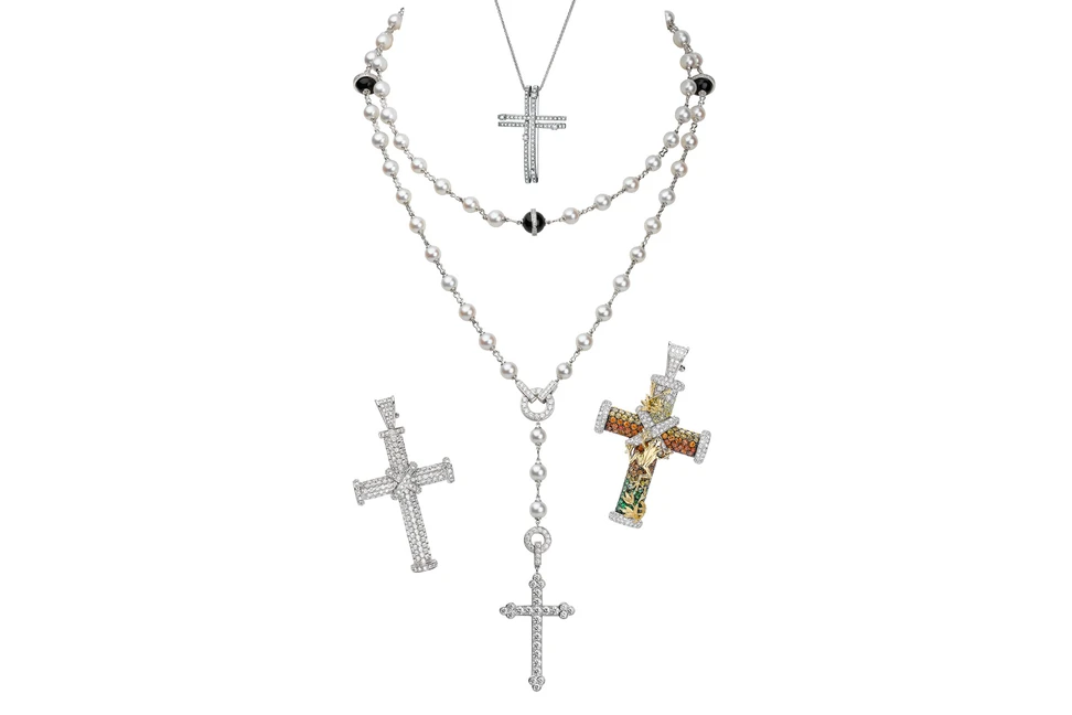 <p>Top: Damiani cross pendant in white gold and diamonds; Cartier necklace with pearls in white gold and diamonds; Theo Fennell cross pendants</p>
