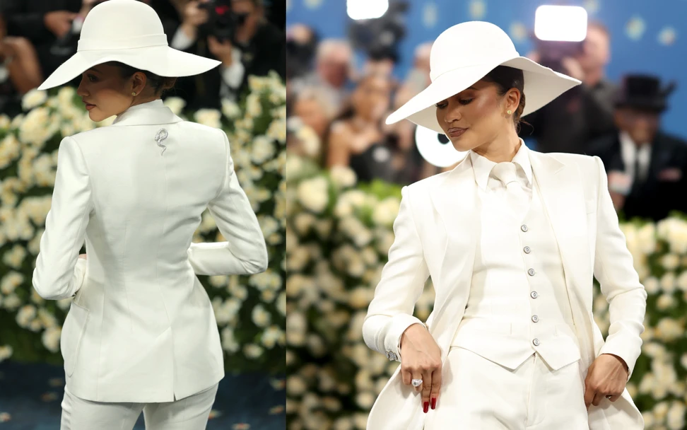 <p>Zendaya&#8217;s all-white look caused a stir on the red carpet, including a Bvlgari High Jewellery Serpenti brooch affixed to the back of her suit</p>

