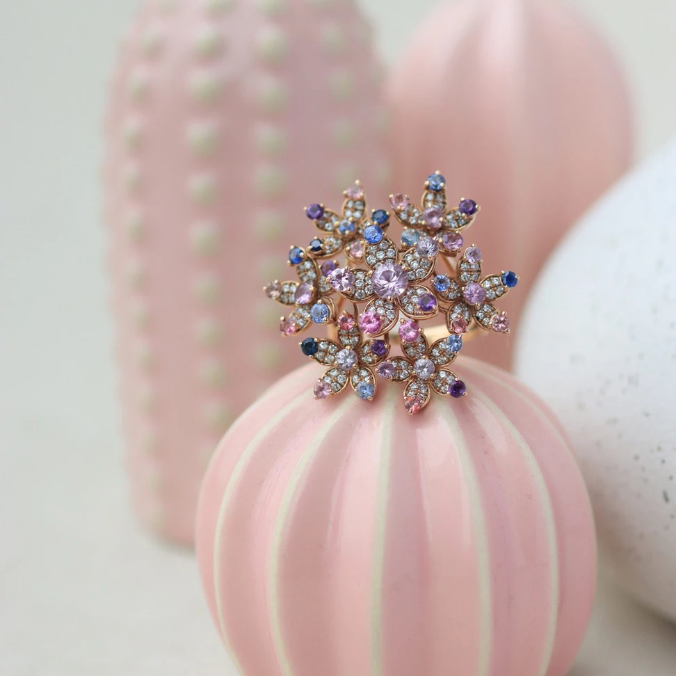 <p>Zome Jewellery Verafleur ring from the Anthia collection with 4.61 carats of multi-coloured sapphires and 185 diamonds in 18k gold </p>