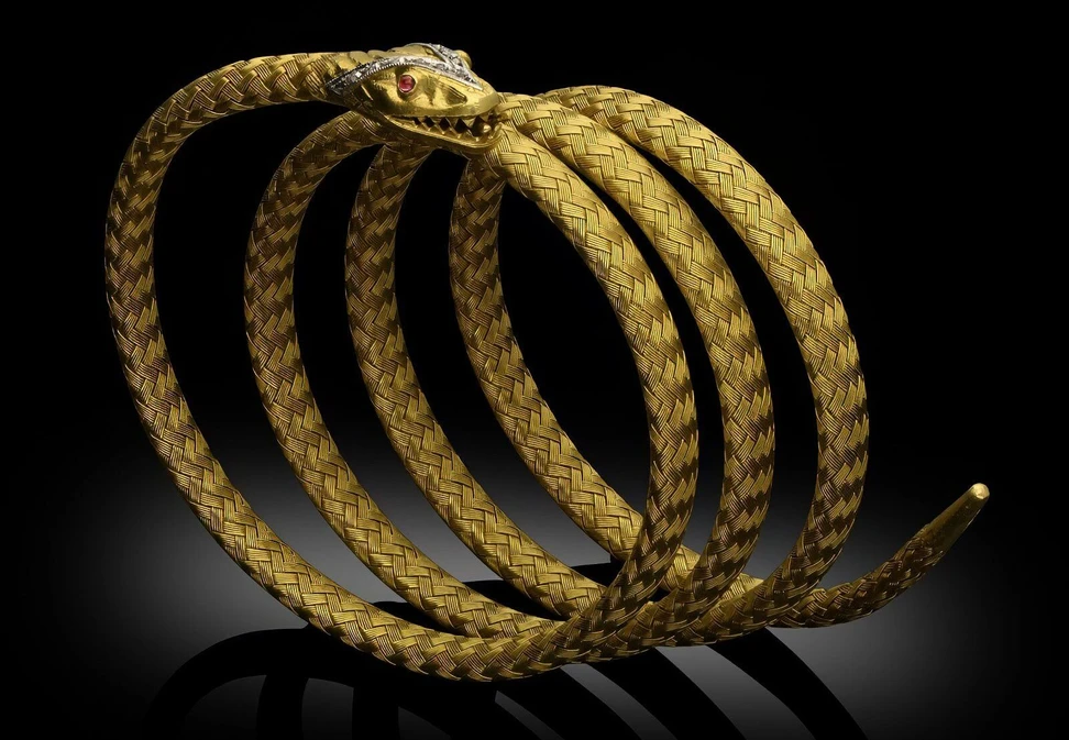 <p>Designed to wrap around the wrist, this antique sapphire and diamond snake bracelet in woven 18 carat yellow gold was crafted circa 1880. Available at Hancocks London.</p>
