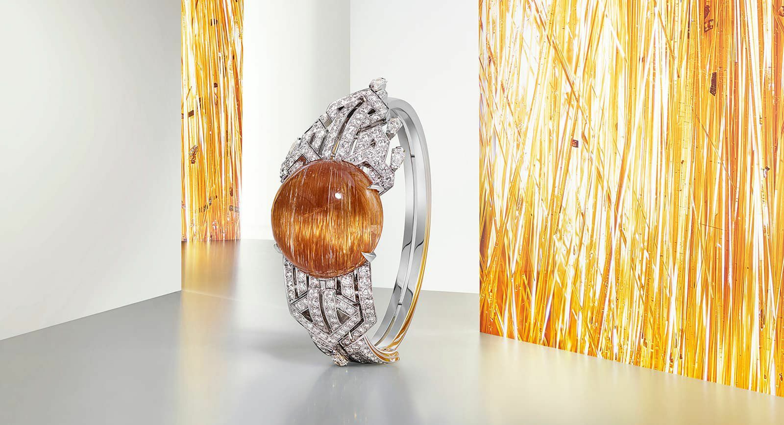 Cartier Magnitude Sorelli secret watch with a dome of golden rutilated quartz