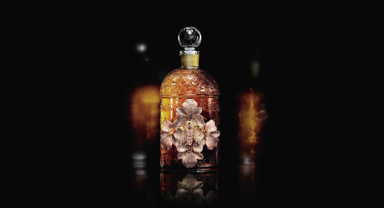 The Bee Bottle by Begüm Khan for Guerlain perfume in gold-plated bronze with pavé gemstones