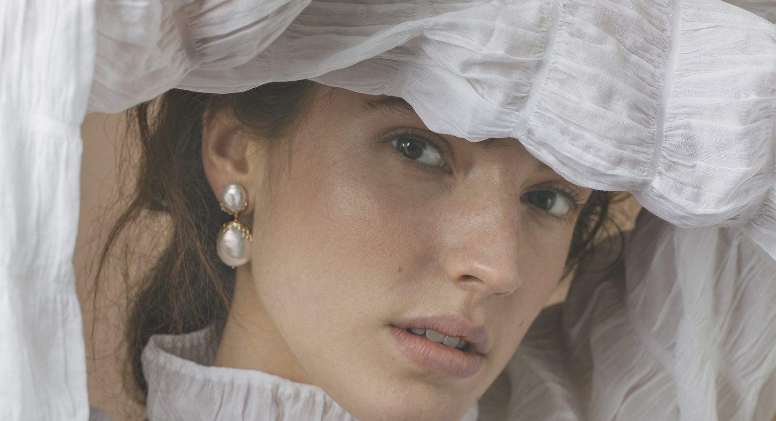Pearl earrings handmade by London-based designer, Jessie Thomas 