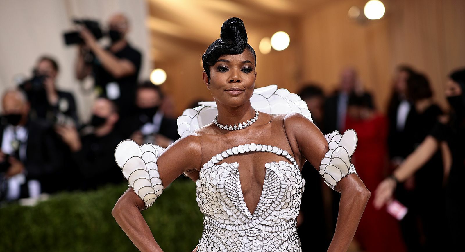 Actress Gabrielle Union wears a pear-shaped diamond necklace by Messika at the Met Gala 2021 