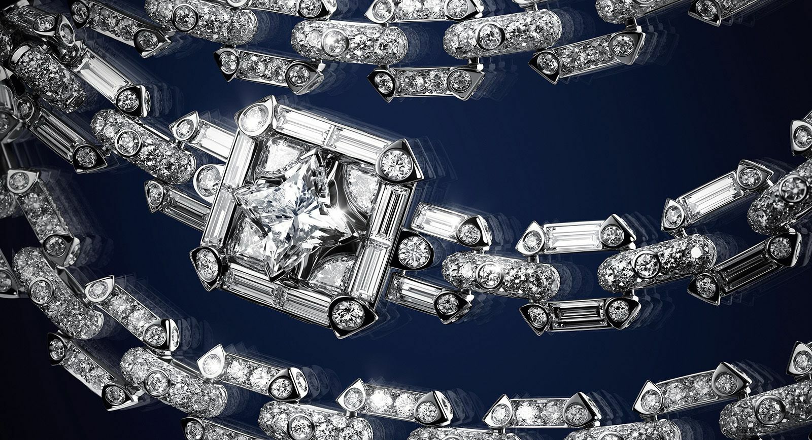 Louis Vuitton Bravery II High Jewellery Collection Mini Malle Necklace in white gold with three LV Monogram Star-cut diamonds for 5.36 carats, 68 custom-cut diamonds for 8.74 carats and 1245 brilliant-cut diamonds for 21.27 carats