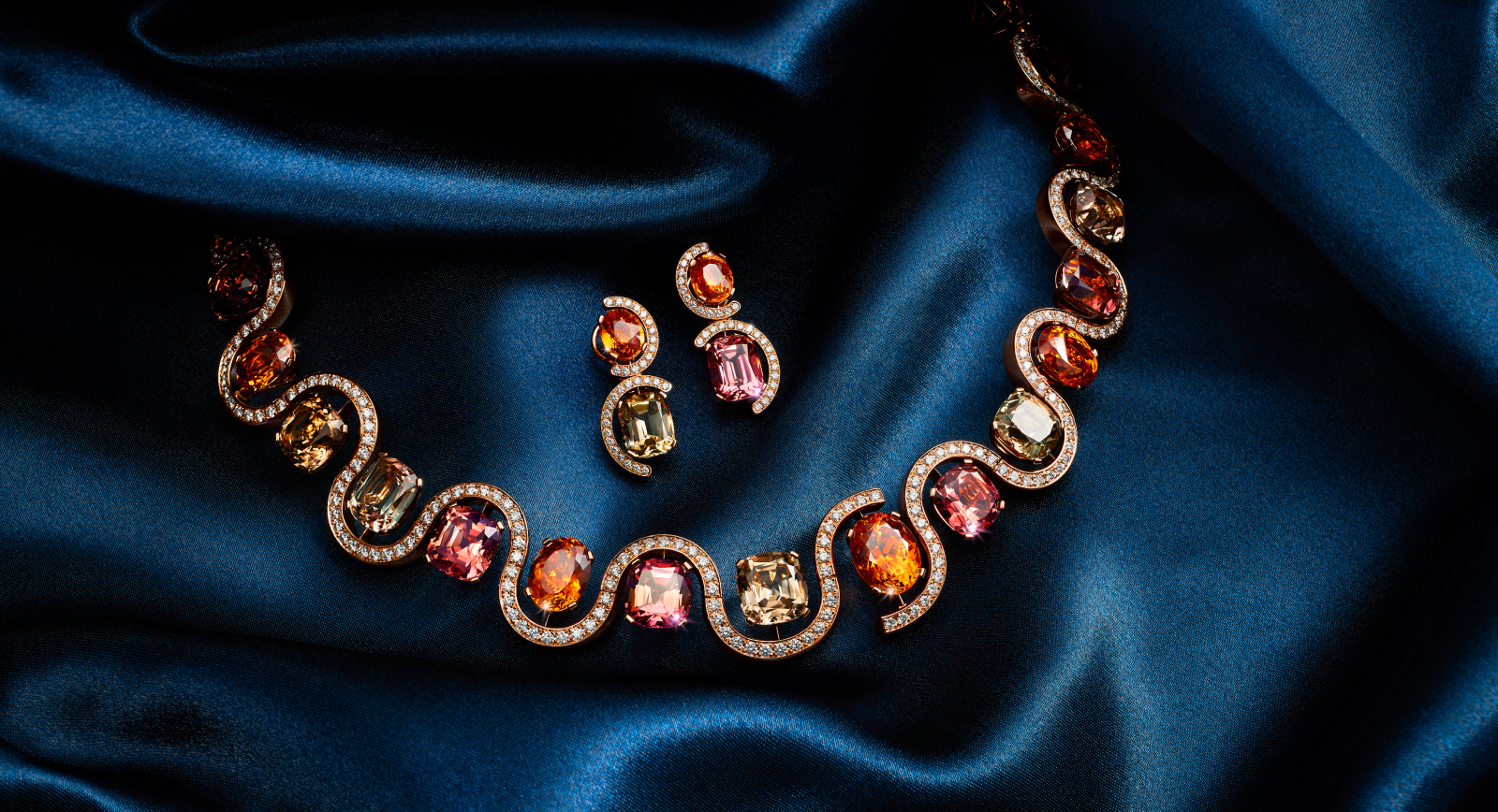 Bucherer Fine Jewellery necklace and earrings with mandarin garnets, tourmalines and diamonds from the Manhattan High Jewellery collection 