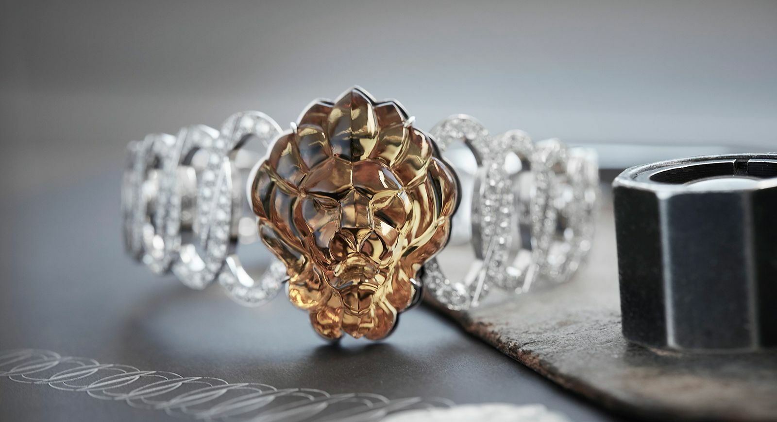 chanel lion brooch