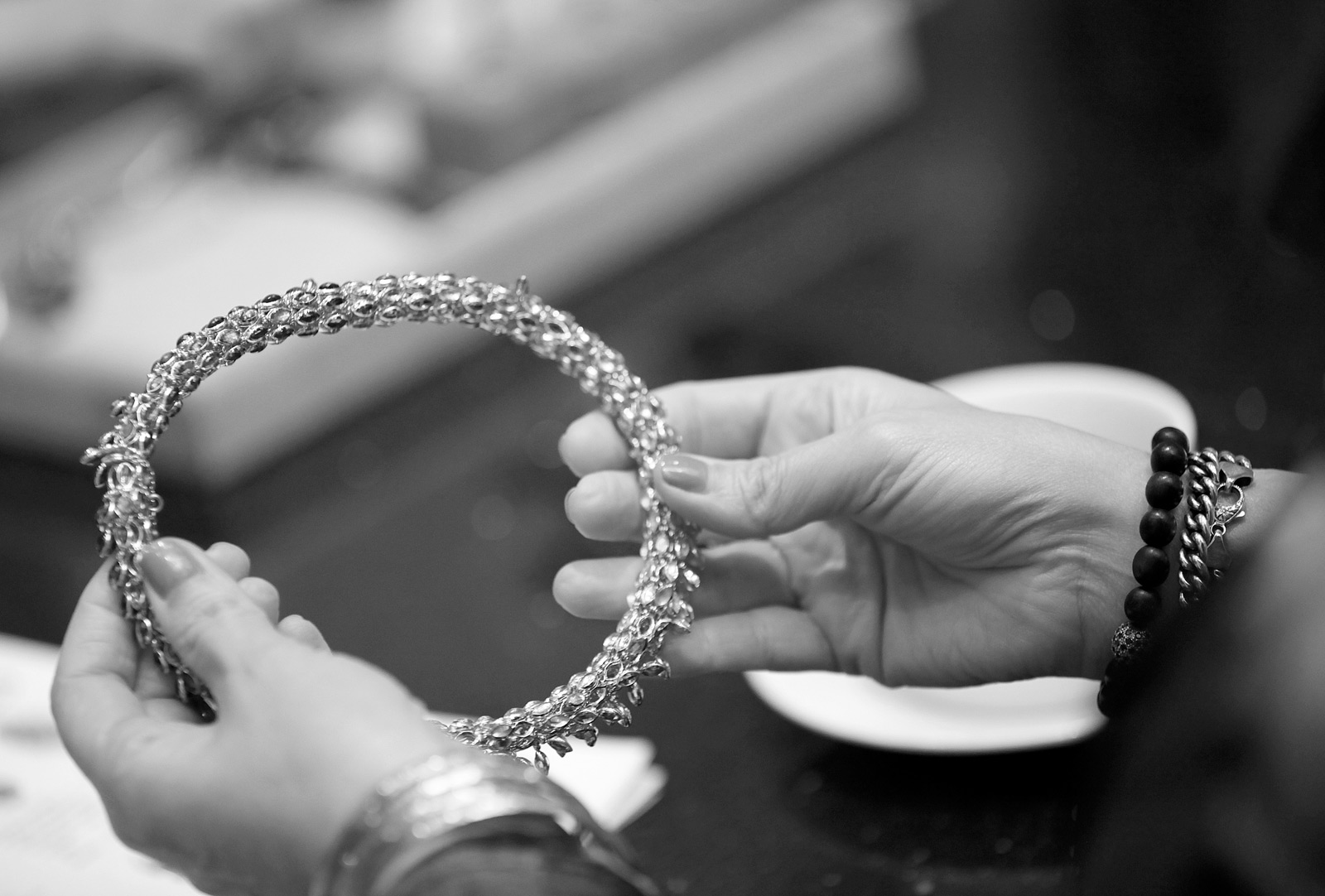  Gemstone necklace being judged