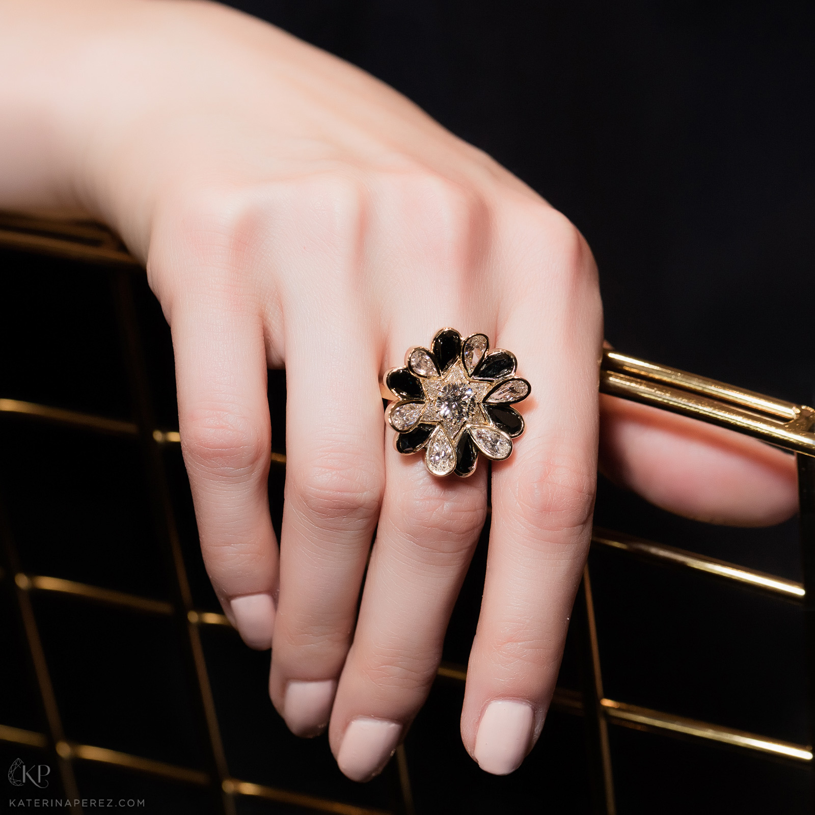 CADAR colourles and black diamonds ring in yellow gold. Photo by Simon Martner.
