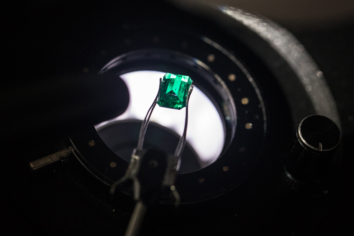 International Emerald Exchange cut and polished Colombian emerald under a microscope. Photo credit: Juan Cristobal Cobo