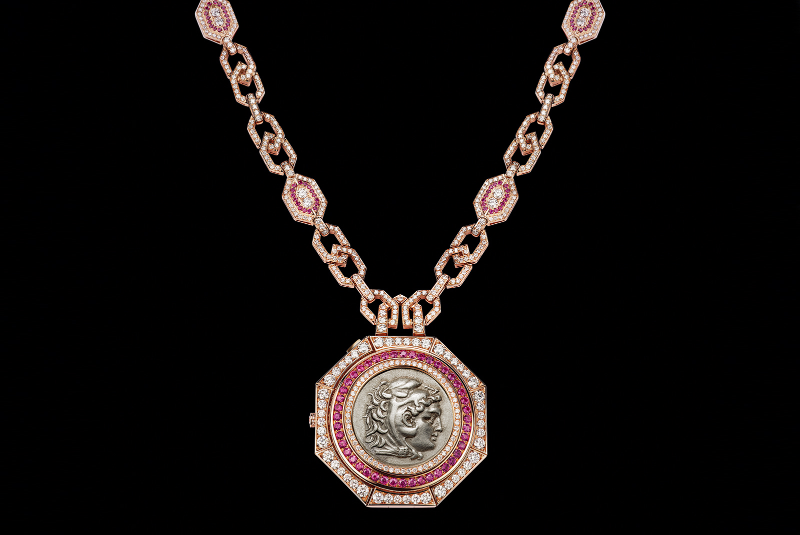  SECRET WATCH MONETE NECKLACE - High Jewellery necklace with secret watch, in pink gold set with 1 silver coin (Macedonia Alexander III, 336-326 B.C.), rubies, diamonds, skeletonized tourbillon lumiere watch with pink gold bridges decorated by hand.