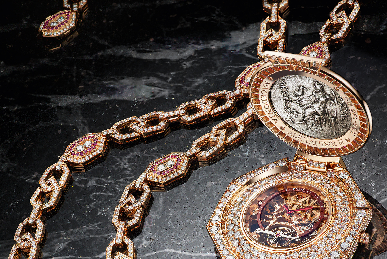  SECRET WATCH MONETE NECKLACE - High Jewellery necklace with secret watch, in pink gold set with 1 silver coin (Macedonia Alexander III, 336-326 B.C.), rubies, diamonds, skeletonized tourbillon lumiere watch with pink gold bridges decorated by hand.