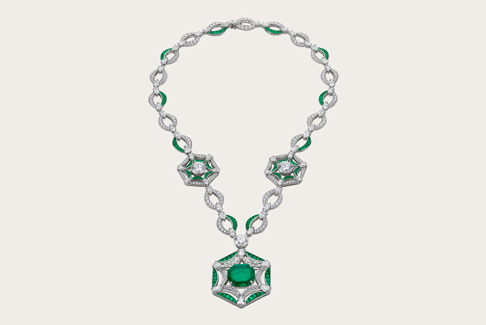  ROYAL BALLROOM - High Jewellery necklace in platinum with 1 octagonal Colombia emerald (11.43 ct), 3 round brilliant cut diamonds (13.83 ct), 56 pear shaped diamonds (28.10 ct), buff top Emeralds (10.48 ct) and pavé diamonds (11.33 ct).