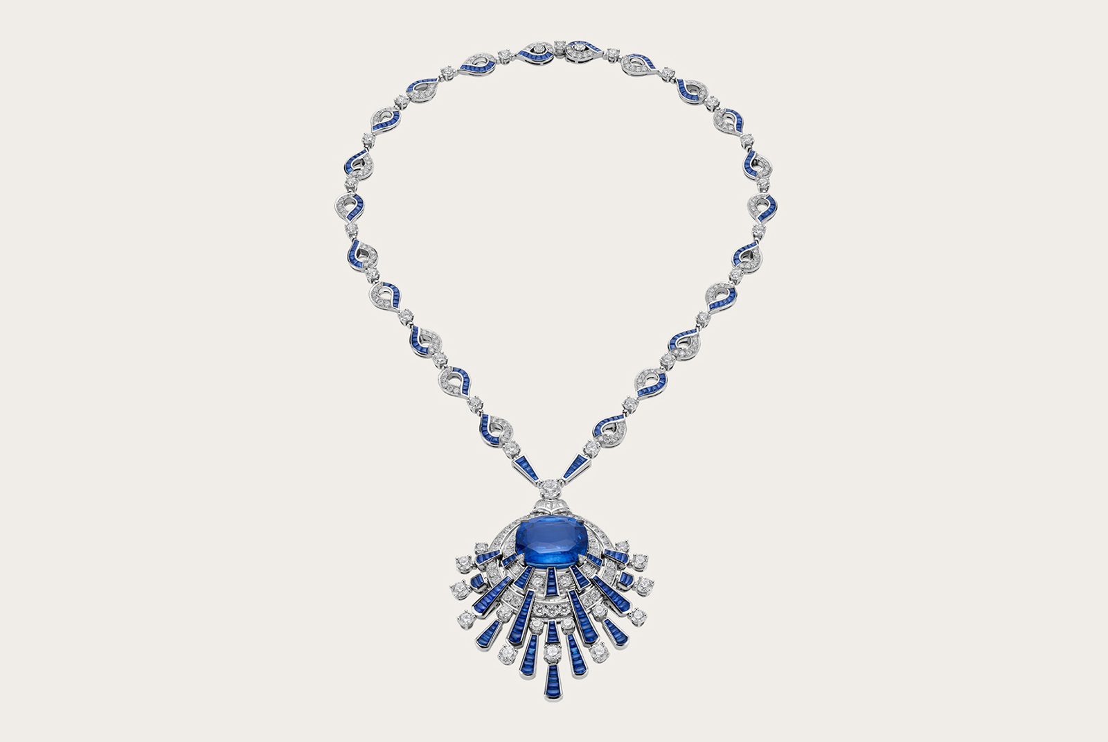  RAGGI BLUE - High Jewellery necklace in platinum with 1 cushion sapphire (36.45 ct), buff top sapphires (14.42 ct), round brilliant cut diamonds (11.37 ct), fancy shaped, step cut diamonds and pavé diamonds (6.28 ct).