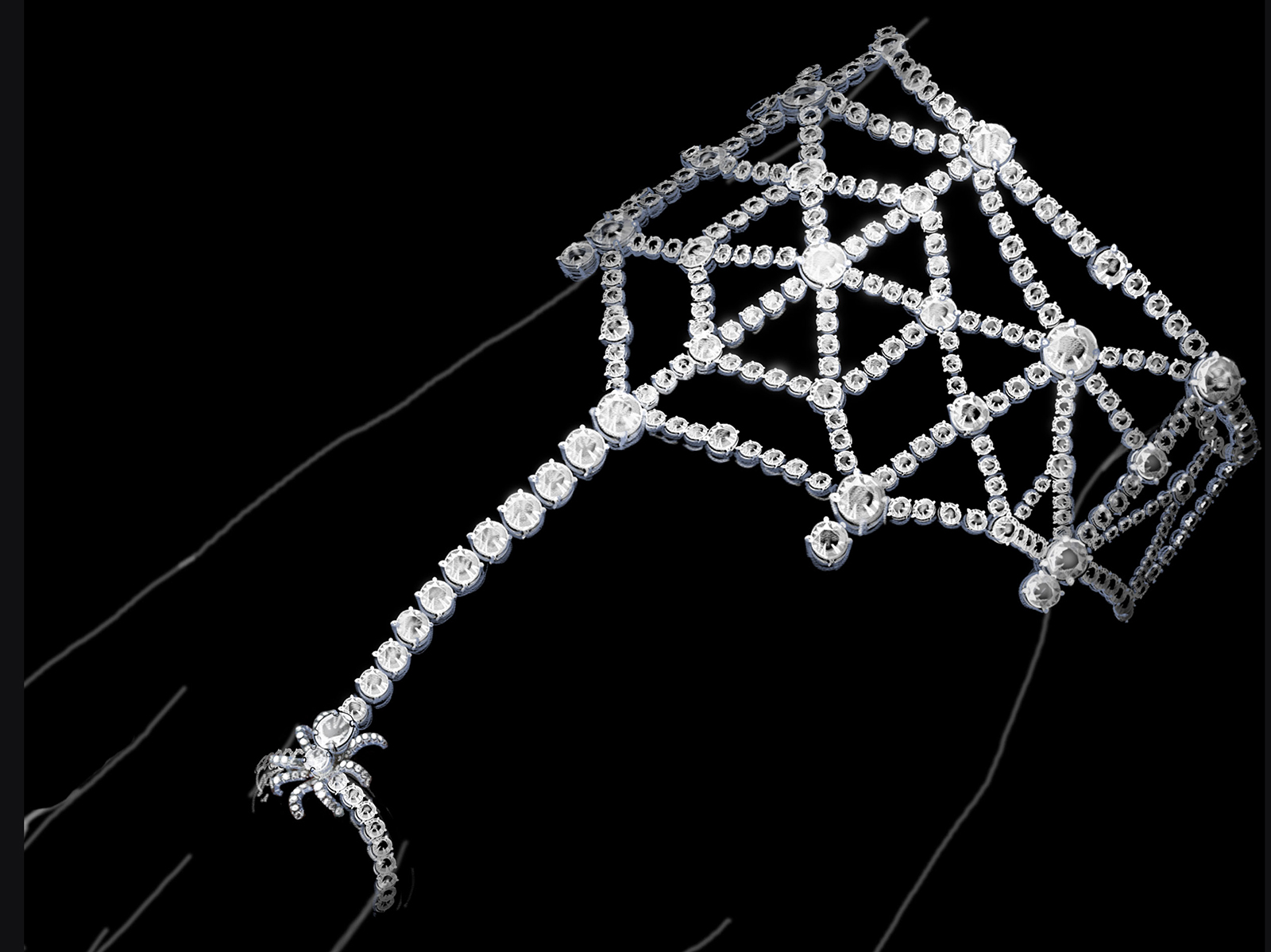 TARANTELLA - High Jewellery bracelet-ring in platinum with 10 round brilliant cult diamonds (3.24ct), round brilliant cut diamonds and pavé-set diamonds (16.43ct).
