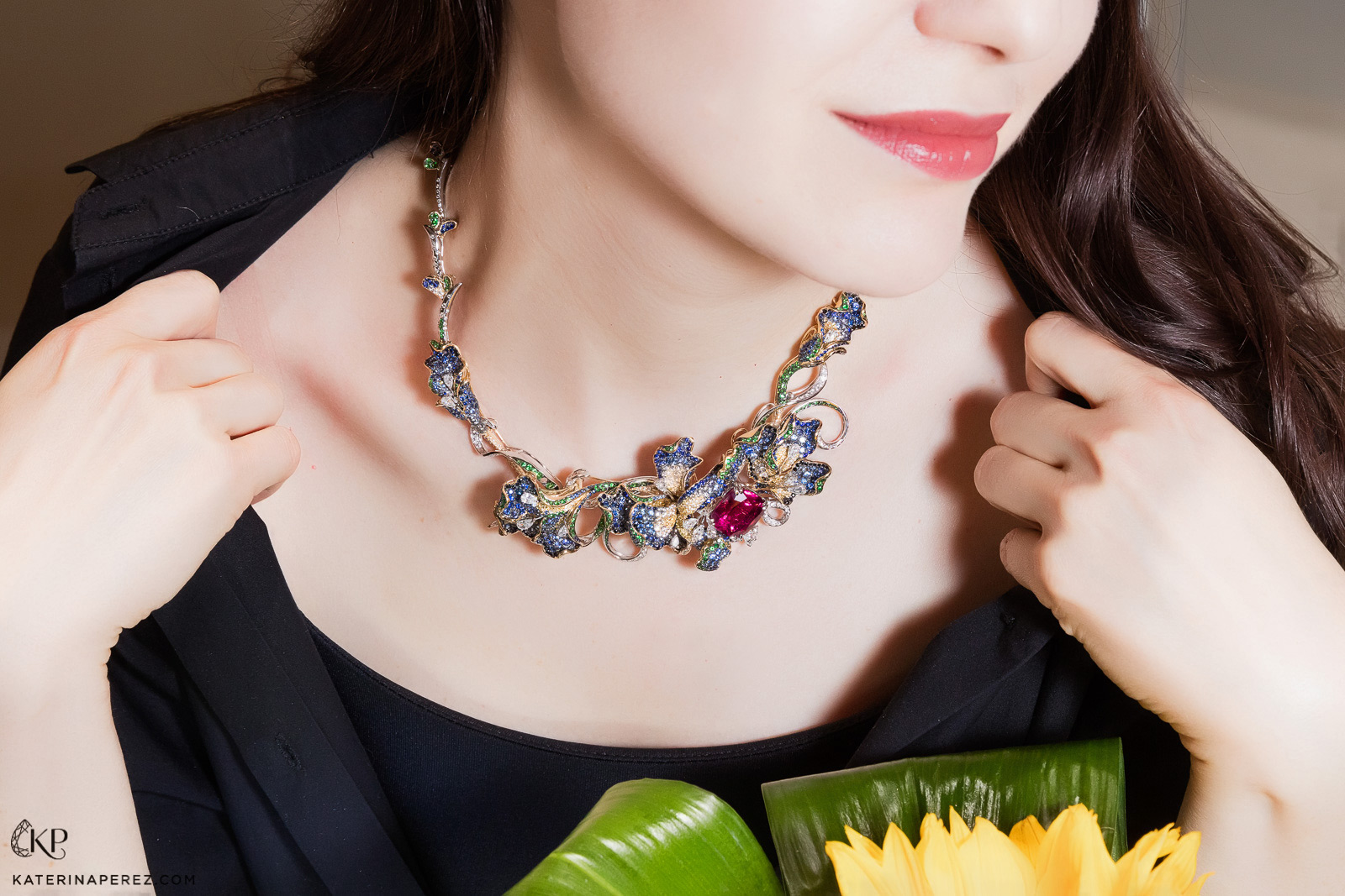 Caratell necklace with an oval rubellite, sapphires and diamonds. Photo credit: Simon Martner