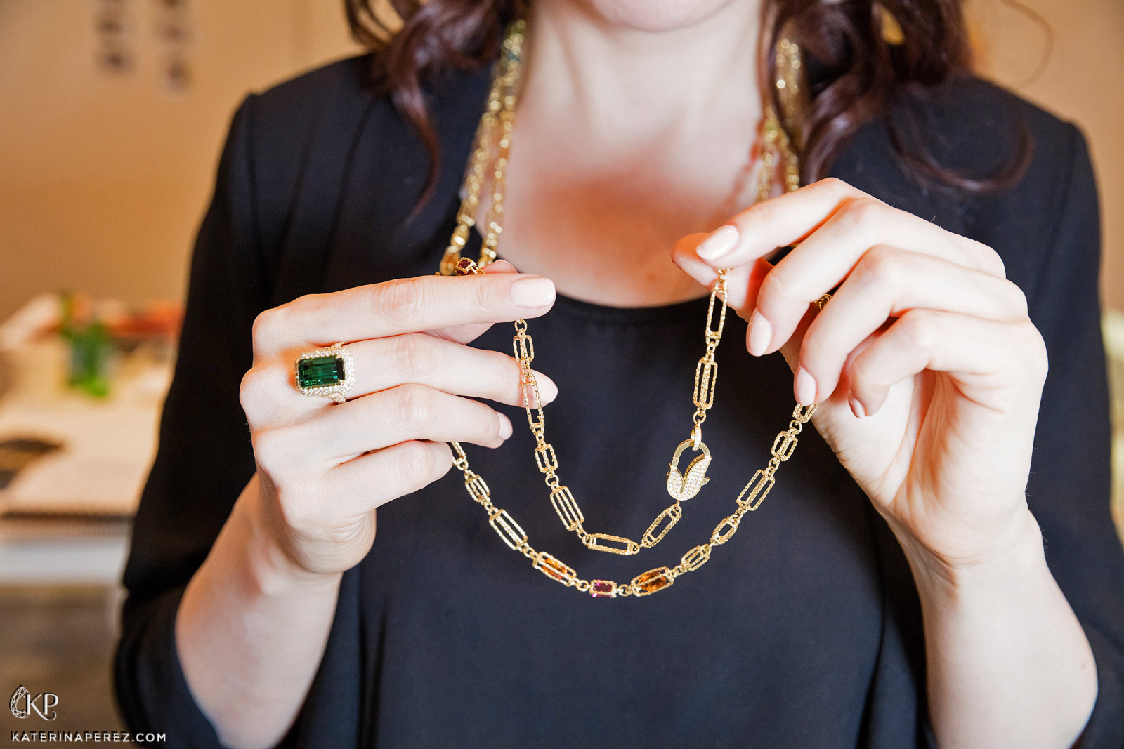 Jordan Alexander yellow gold chain with peridot, rhodolite garnet and blue topaz.  Photo by Simon Martner