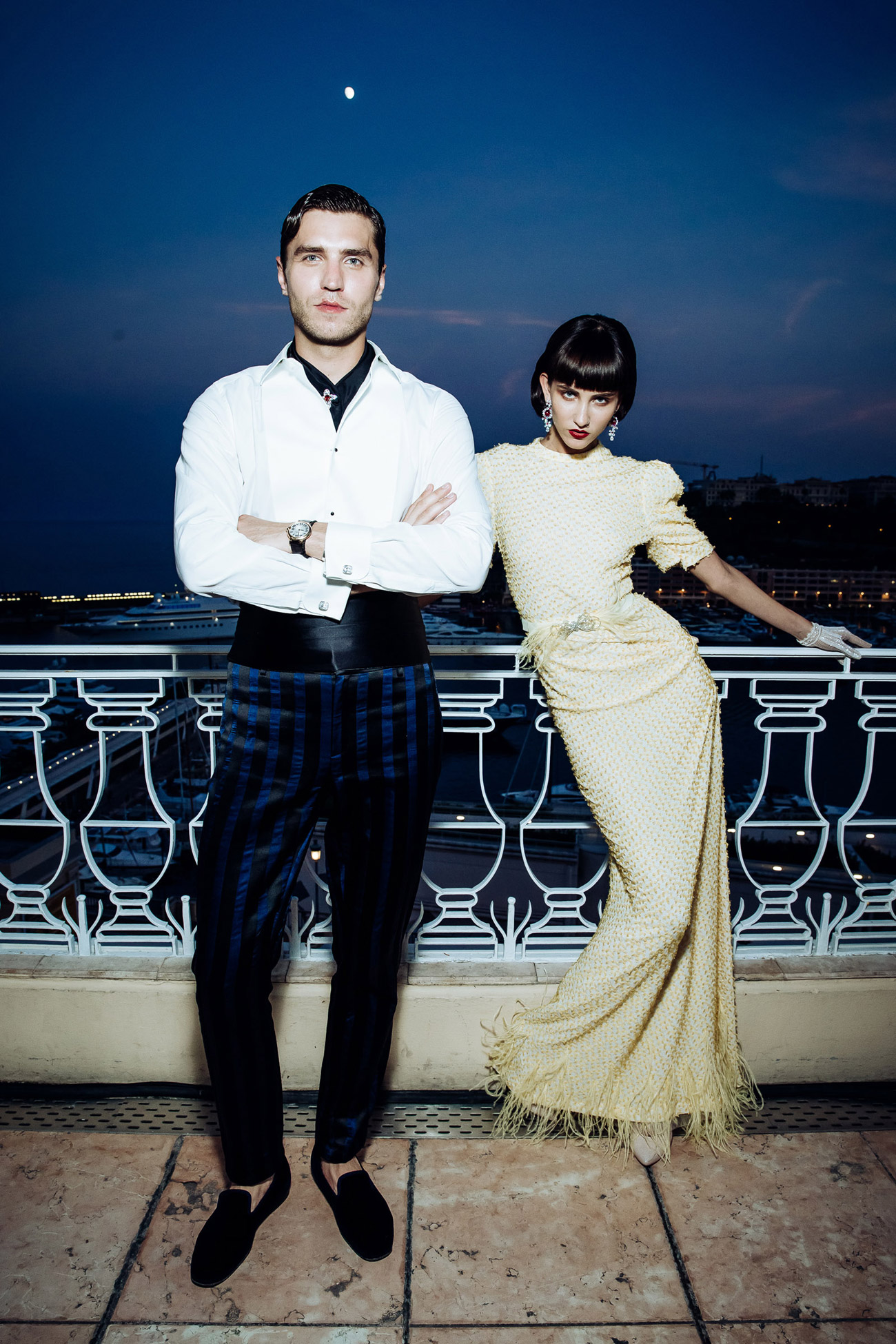  Frol Burimskiy and a model wearing Ulyana Sergeenko Couture and Faidee jewellery. Photographer: Grigoriy Galantniy