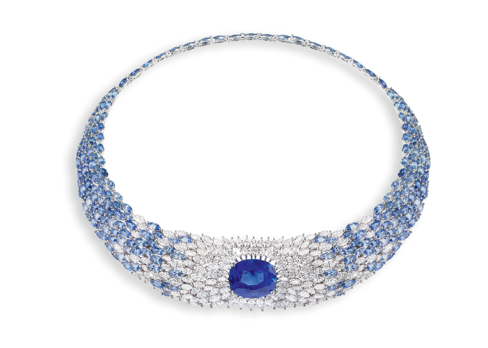  The Sea Temptation Necklace by Piaget in 18K white gold set with 1 oval-cut blue sapphire from Ceylan (22.68 cts), blue sapphires and diamonds