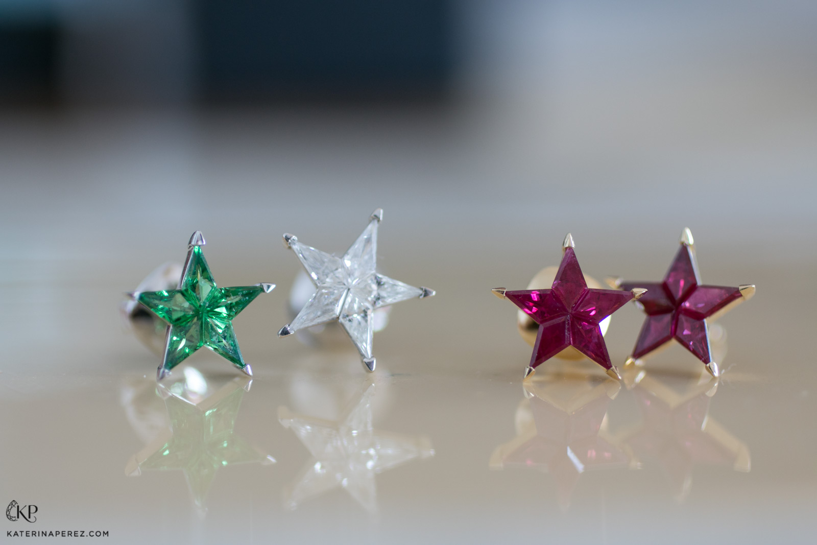  By Stolie Star studs in rubies, diamonds and emeralds