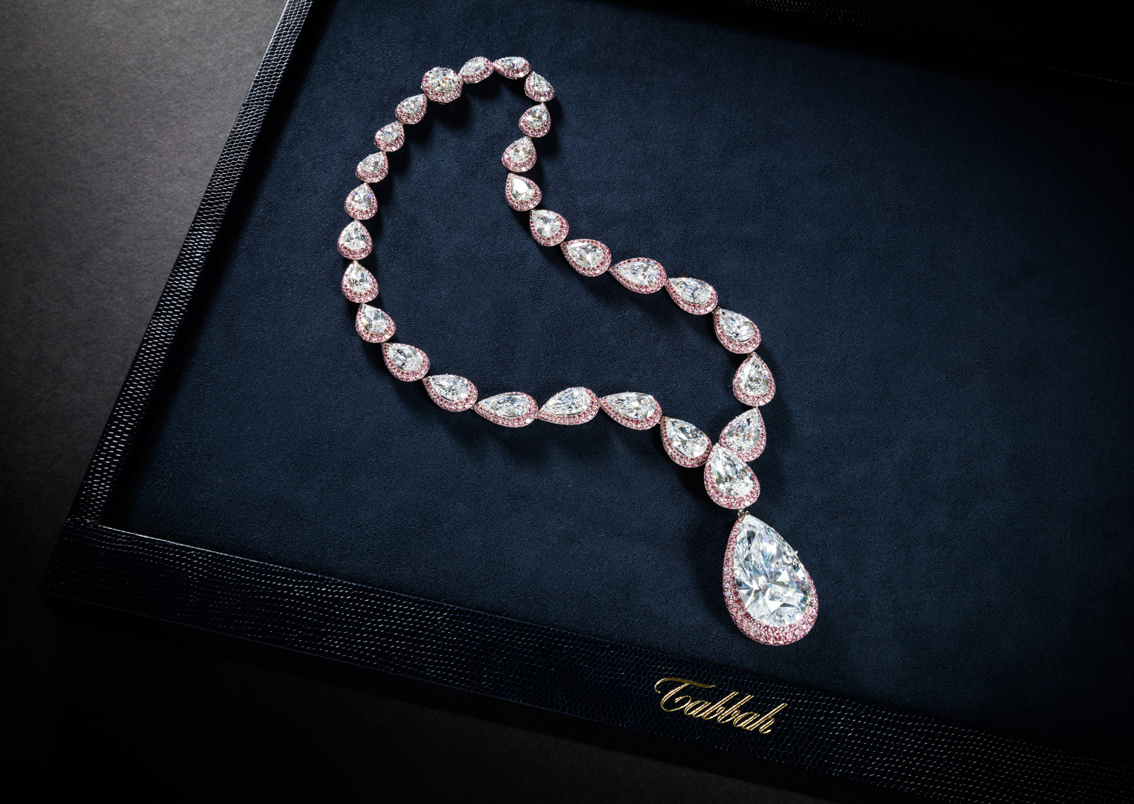 Maison Tabbah commissioned necklace with a pear-shaped colourless diamond and pink diamonds