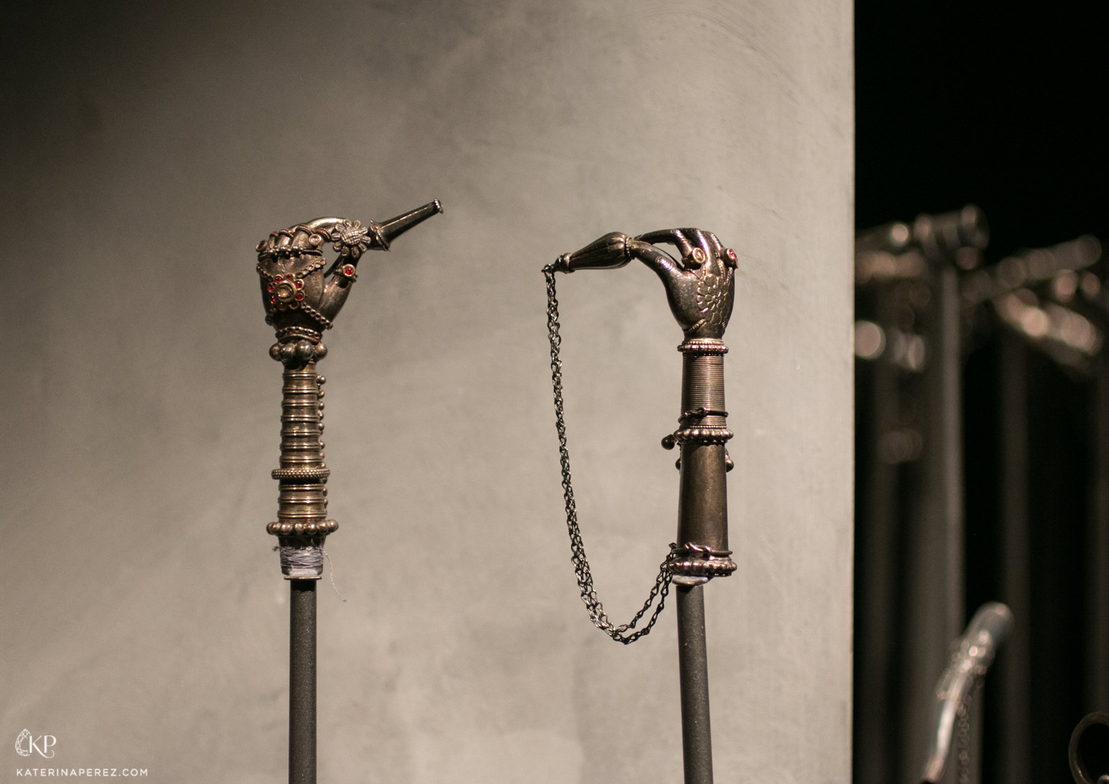  The first two pieces which Mr. Gyan collected, two silver mouthpiece smoking accessories in the shape of hands, adorned with jewels: exquisitely engraved bracelets and rings with cabochon rubies, from West India, Seventeenth Century 