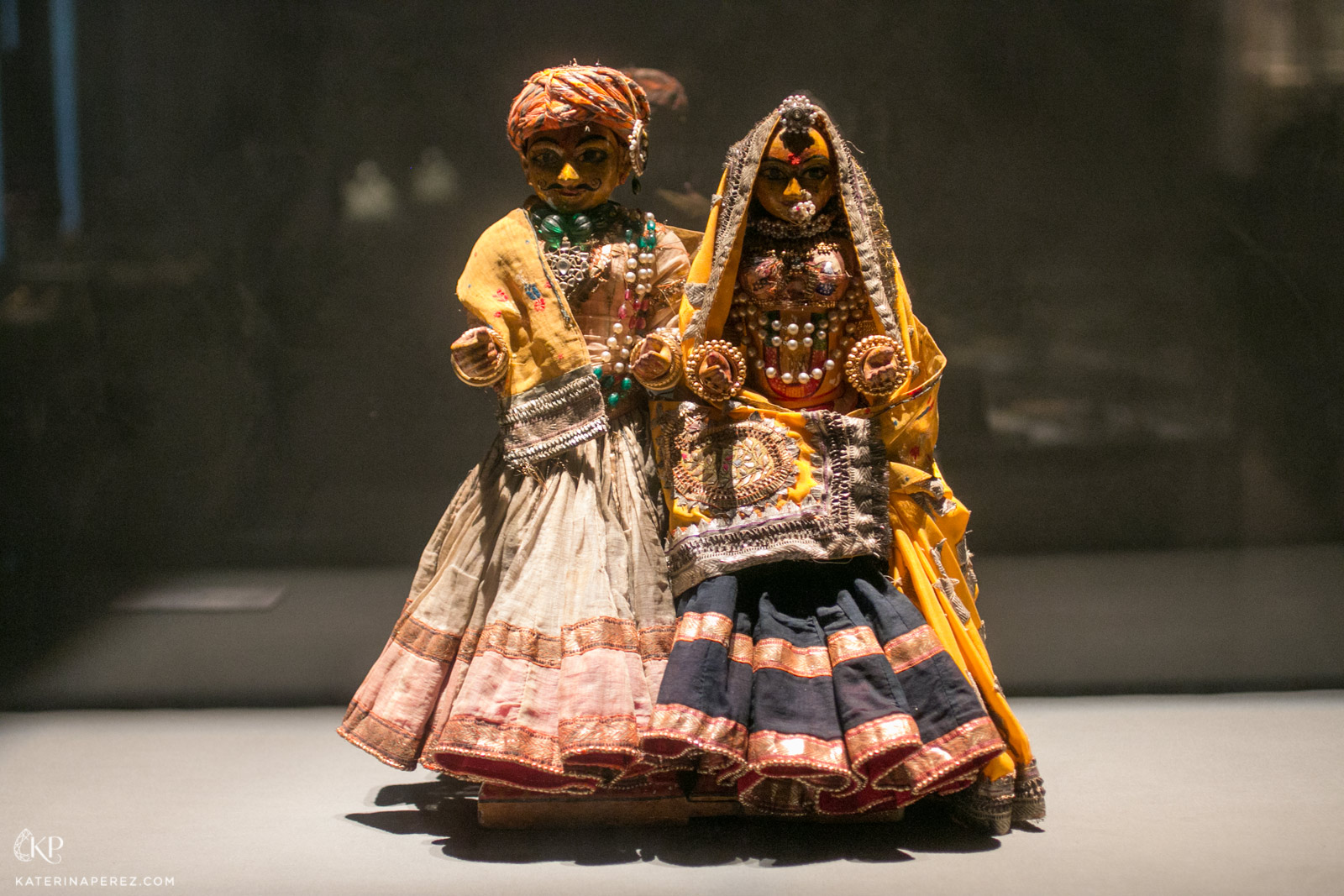  Set of Gangaur dolls in traditional dress including full pearl, ruby and emerald jewellery, from Jaipur, late Nineteeth Century 