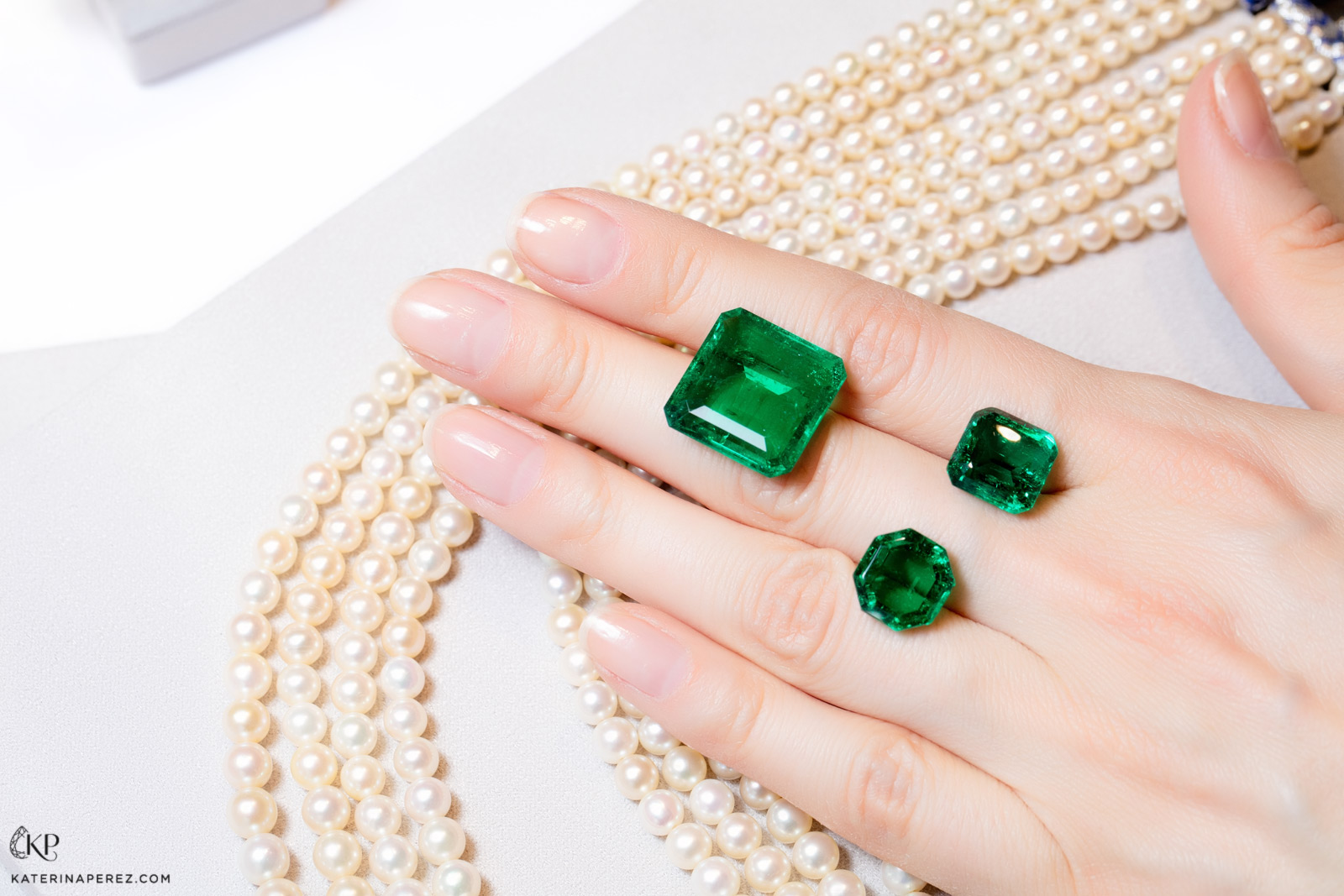 Emeralds cut and polished at Dharmendra Tank's factory in Jaipur. Photo by Simon Martner.