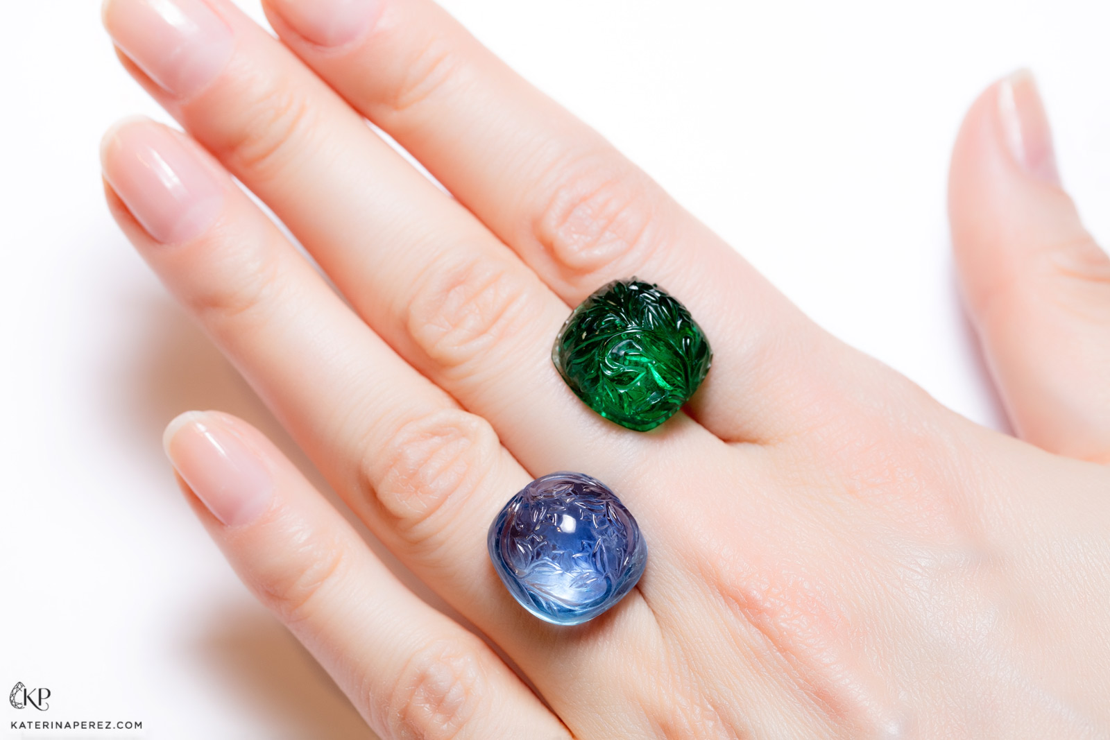 Dharmendra Tank's carved sapphire and emerald. Photo by Simon Martner.