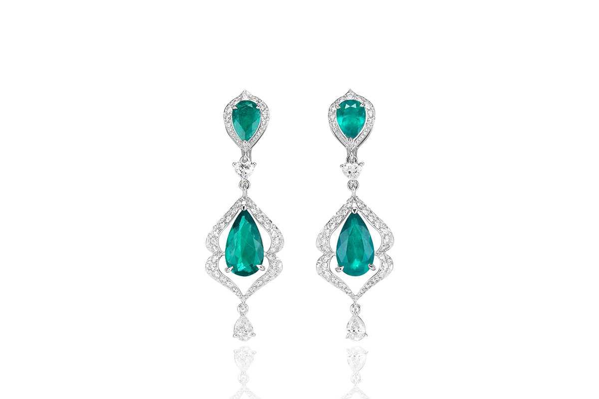  Precious Chopard earrings in white gold with emeralds and diamonds