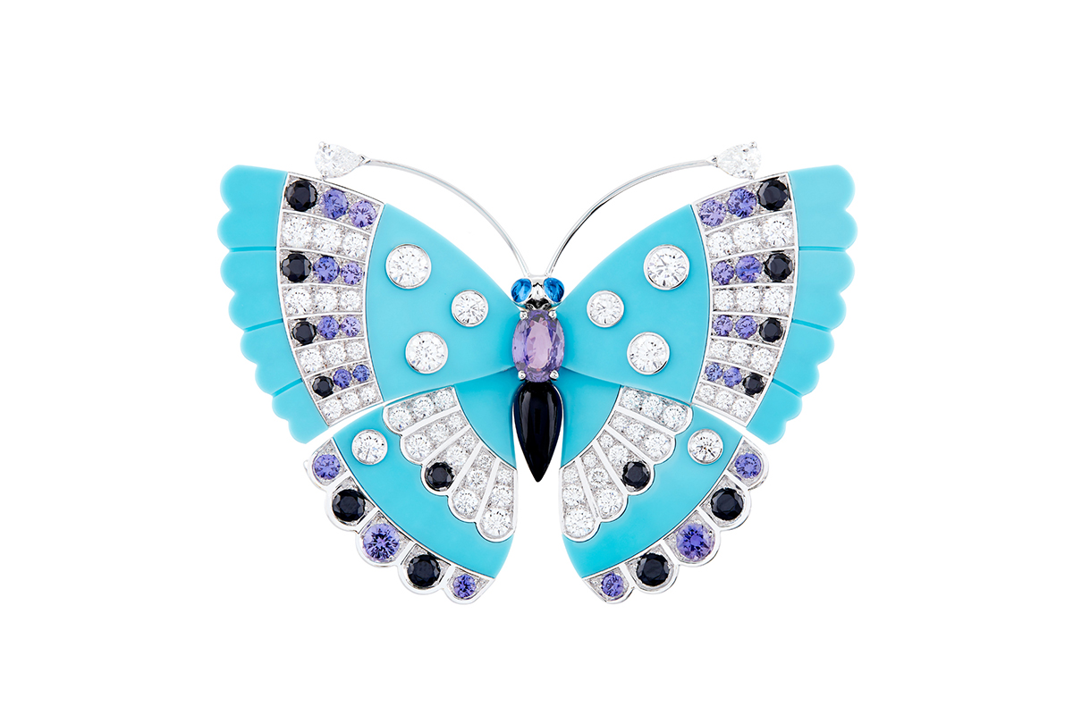  Van Cleef & Arpels 'Féodora' Turquoise butterfly clip in White gold, round and pear-shaped diamonds, cabochon- cut blue sapphires, round and oval-cut mauve sapphires, round black spinels, onyx, turquoise