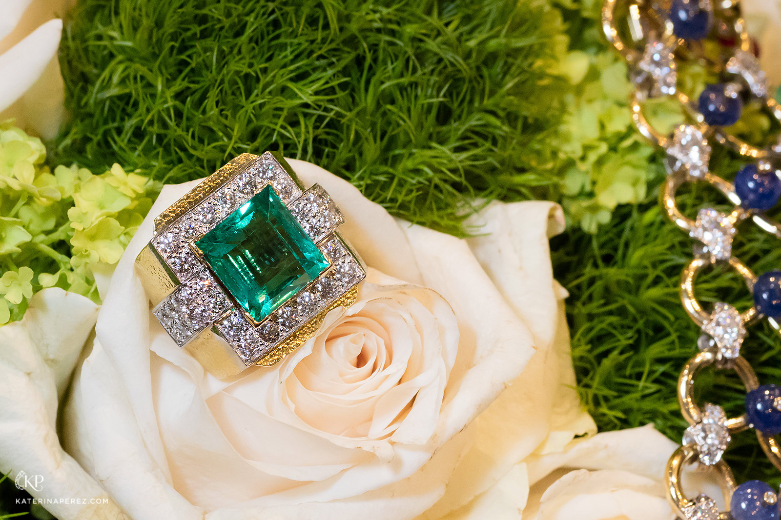 David Webb ring in white and yellow gold with emerald and diamonds. Photo by Simon Martner