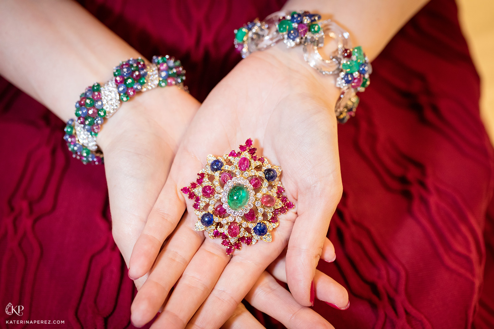  David Webb brooch with sapphires, rubies, diamonds and cabochon emerald