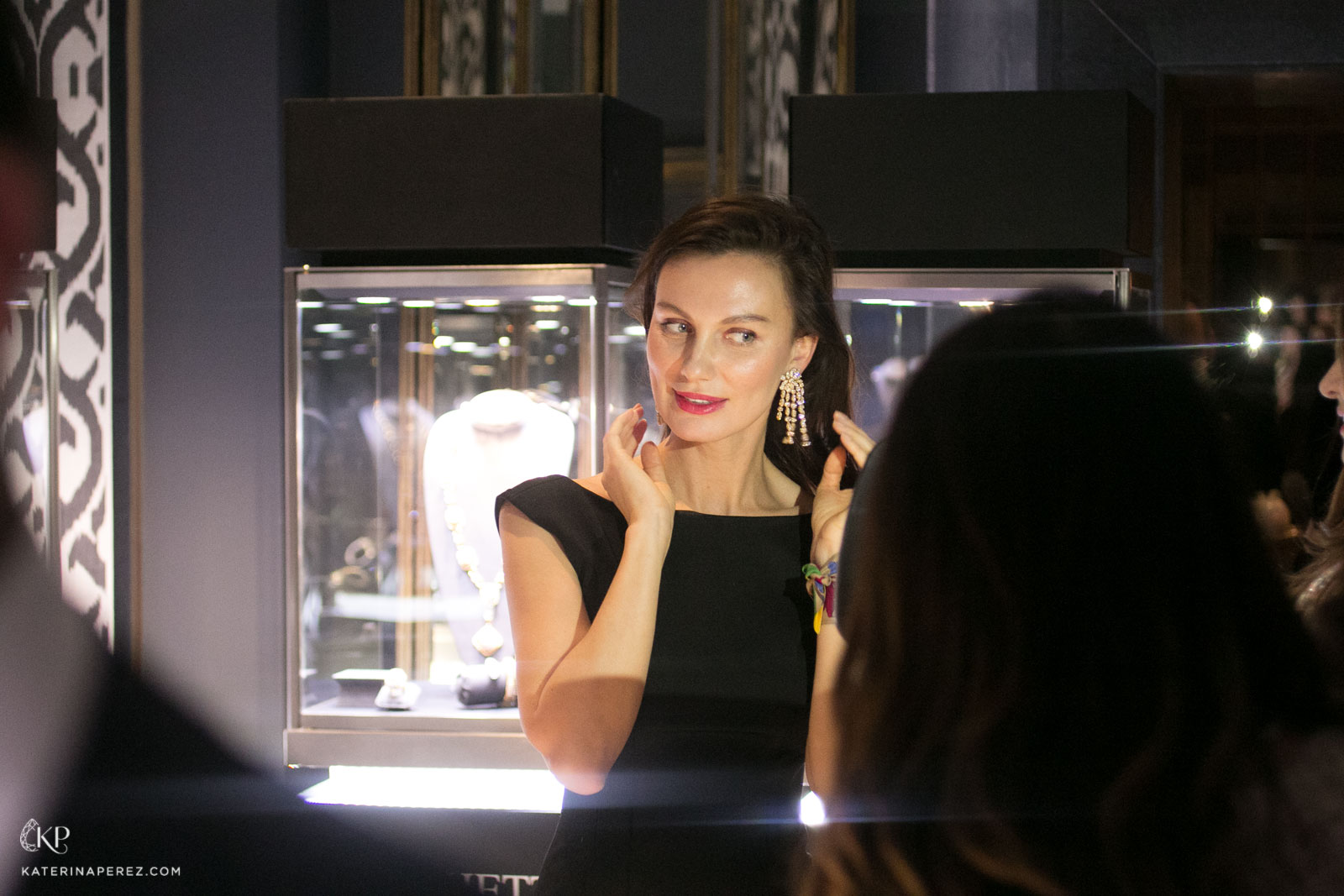 Model wears Veschetti earrings in yellow and colourless diamonds
