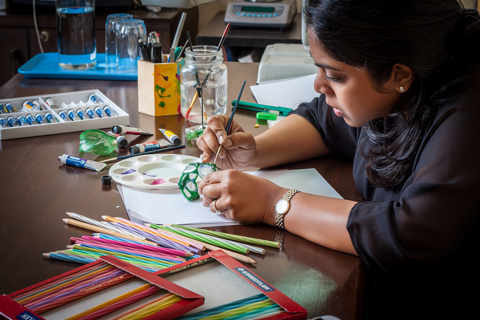  Neha Dani working on the 'Aialik' cuff from the 'Glacier' collection wax model