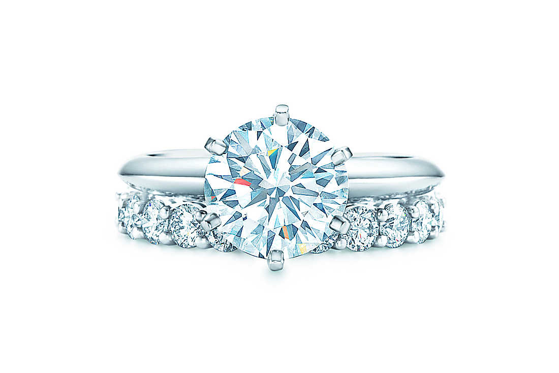  Tiffany & Co. diamond solitaire engagement ring and eternity wedding band 