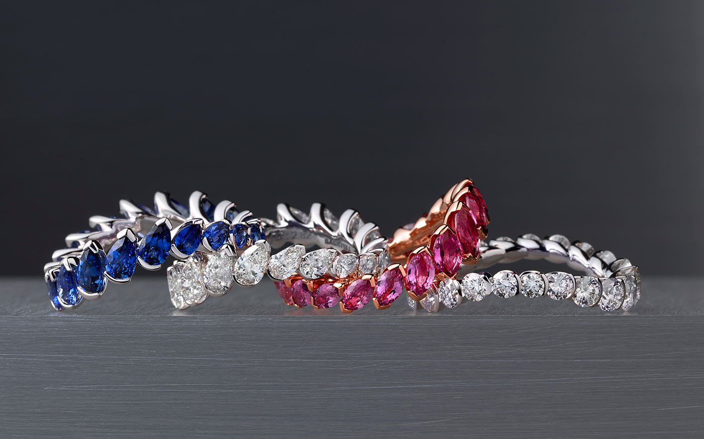  Baenteli Cascade rings with pink and blue sapphires as well as diamonds