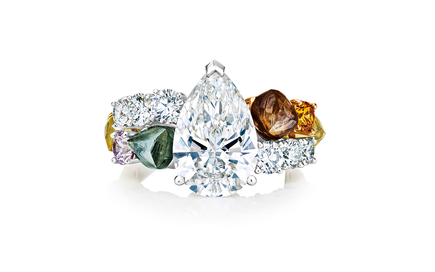 De Beers 'Vulcan' ring with 3.53 ct pear cut diamond surrounded by rough diamonds in a variety of cuts and colours