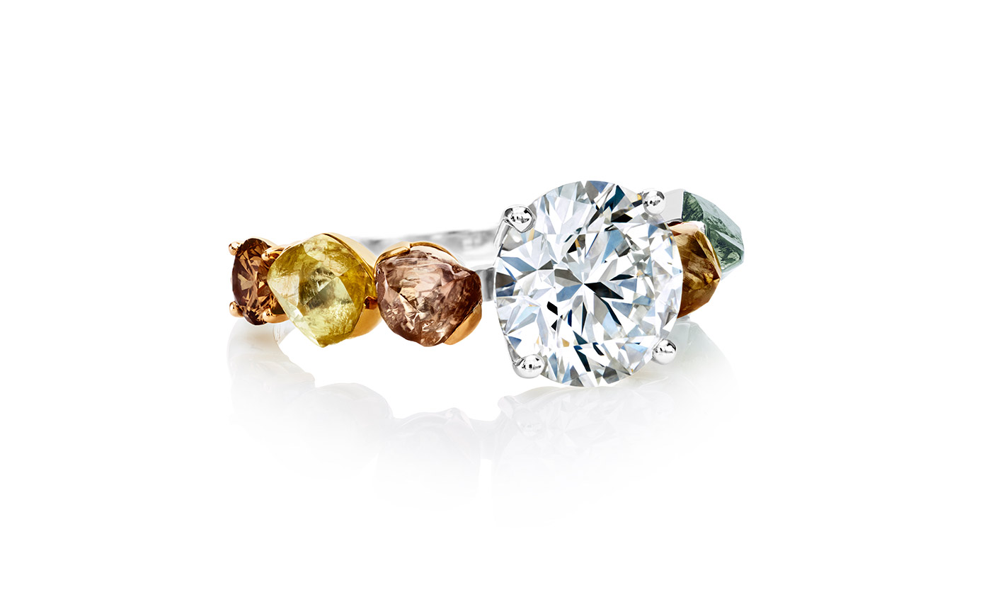  De Beers 'Vulcan' ring with 2.52 ct round brilliant cut diamond surrounded by rough diamonds in a variety of cuts and colours