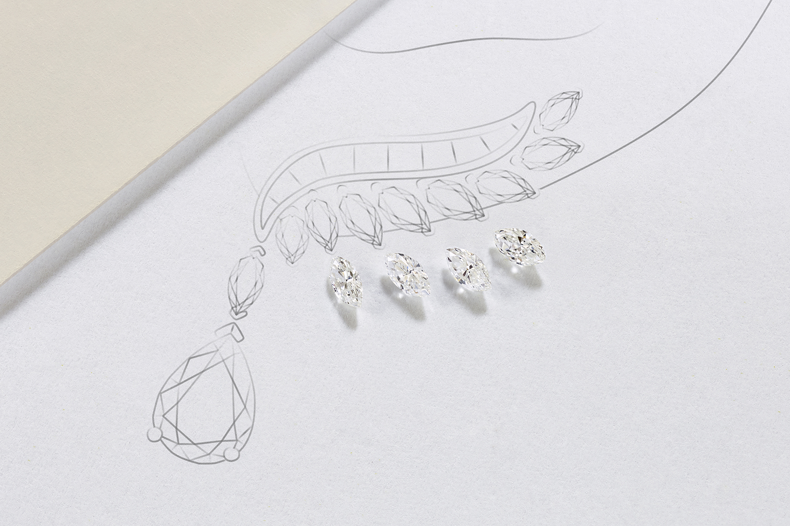 The making of De Beers ‘Cupid’ ear cuffs in total of 3.57ct princess and marquise cut diamonds with pear shaped drops